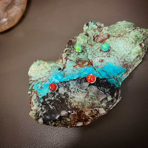 Explore watercolor tattoo ideas for females, creative tattoo ideas in Cary, available at Fine Art Body Piercing By Lilith Mae