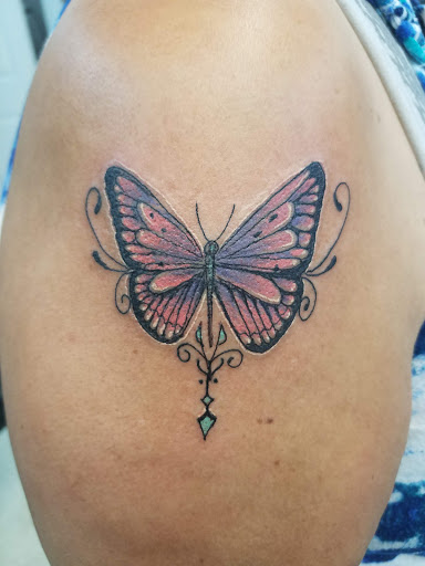 Explore men's forearm tattoo ideas, creative tattoo ideas in Fort Mohave, available at RedRum Tattoo & Body Piercing Co.