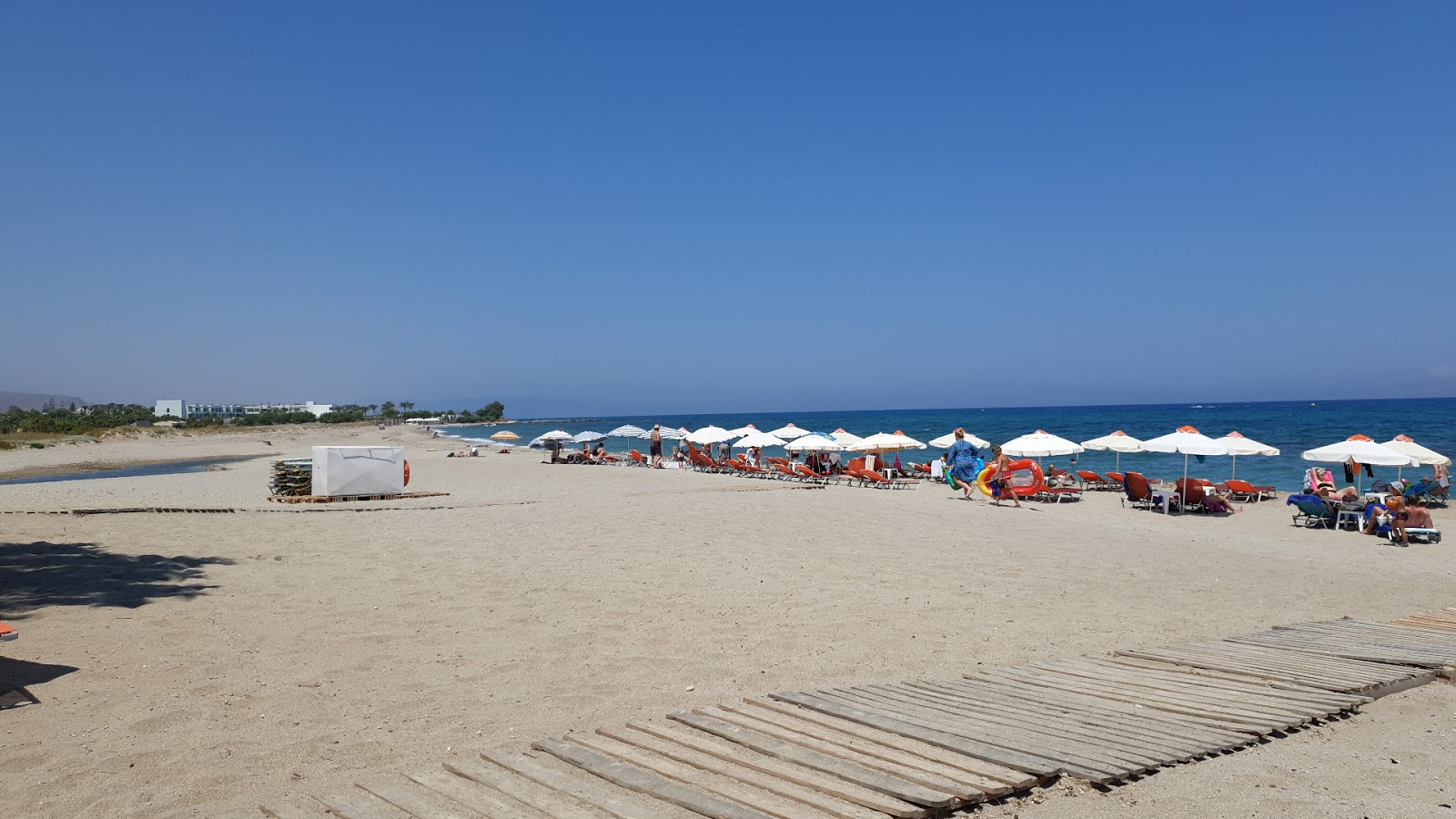 Foto av Aposelemi Beach med grönt vatten yta