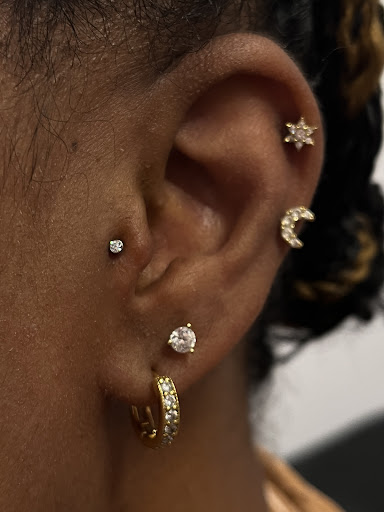 Explore fist bump tattoo ideas, creative tattoo ideas in Kissimmee, available at Fallen Heroes Tattoo & Piercing (Florida)