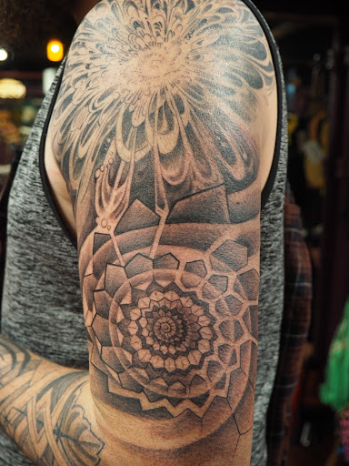 Explore mens religious tattoo ideas, creative tattoo ideas in Charlotte, available at Haylo Healing Arts Lounge