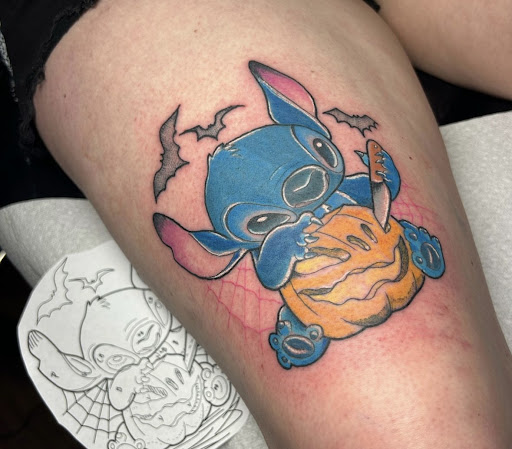 Find peacock tattoo ideas for your next unique tattoo in Rogers at Saved by Grace Tattoo Studio