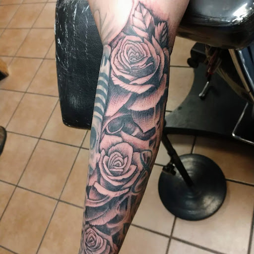 Explore february birth flower tattoo ideas, creative tattoo ideas in Rapid City, available at Convicted Designs Tattoo & Piercing