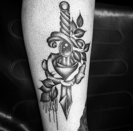 Explore american traditional elbow tattoo ideas, creative tattoo ideas in San Diego, available at Sideshow Tattoo and Piercing