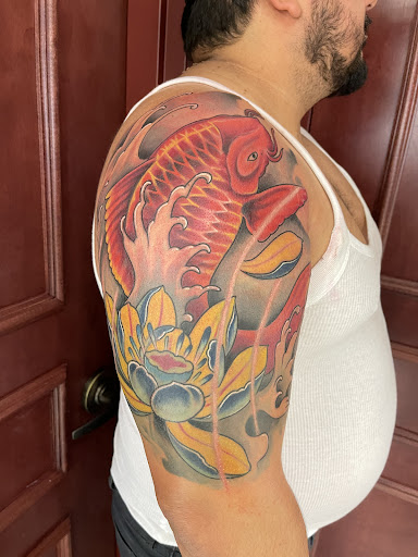 Explore dad and son tattoo ideas, creative tattoo ideas in Pine Brook, available at Mr Ink Tattoo Studio