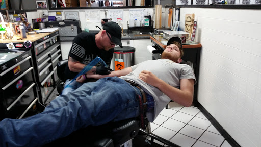 Explore cover up tattoo ideas for men, creative tattoo ideas in Panama City Beach, available at Oxygen Tattoo and Body Piercing Studio