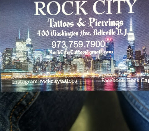 Explore back flower tattoo ideas, creative tattoo ideas in Belleville, available at Rock City Tattoos & Body Piercing