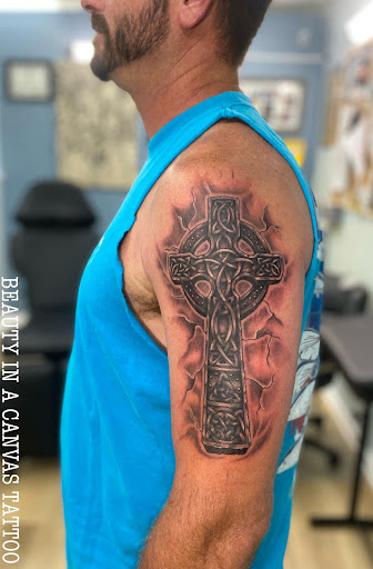 Explore shoulder scar tattoo ideas, creative tattoo ideas in Ocala, available at Beauty in a Canvas Tattoo and Art Gallery