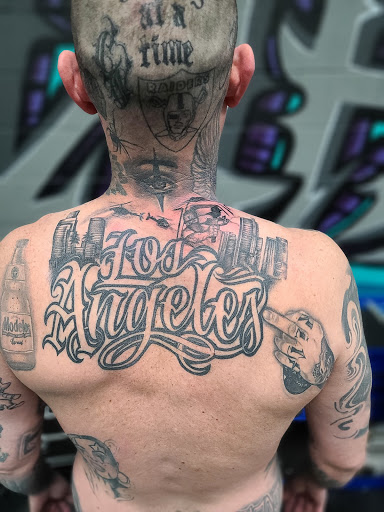 Explore neck tattoo idea, creative tattoo ideas in Whittier, available at Whittier Tattoo