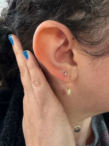 Explore tattoo behind ear ideas, creative tattoo ideas in New Orleans, available at Rowan Magazine Street