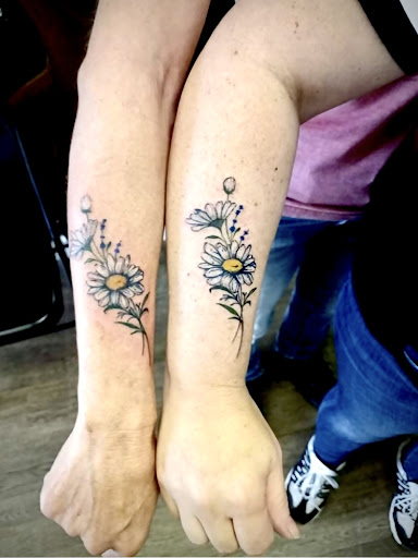 Explore sleeve tattoo background ideas, creative tattoo ideas in Lake City, available at Crooked Spines Tattoo Studio