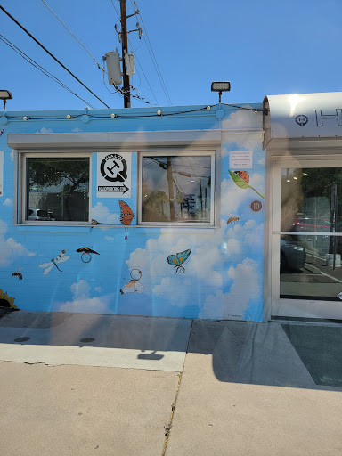 Explore dart tattoo ideas, creative tattoo ideas in Phoenix, available at Halo Piercing and Fine Jewelry