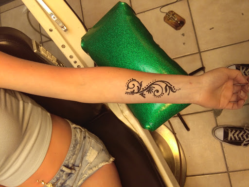 Explore running tattoos ideas, creative tattoo ideas in Bradenton, available at Memory Lane Tattoo Co.