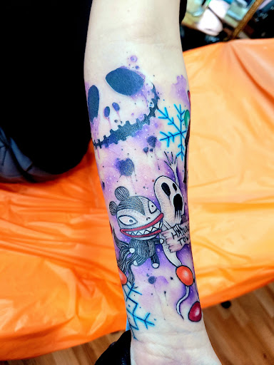 Explore wisdom tattoo ideas, creative tattoo ideas in Benton, available at Spectrum Tattoo