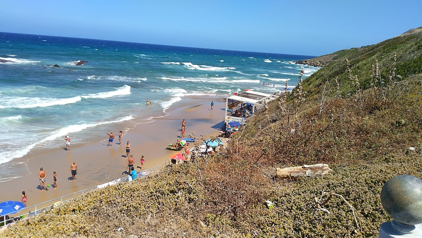 Fotografija Spiaggia della Madonnina obkrožen z gorami