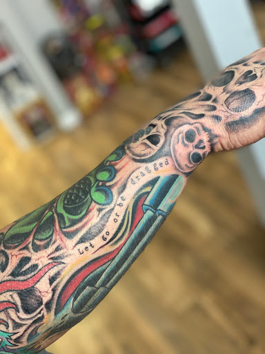 Find tattoo ideas for your mom for your next unique tattoo in Sound Beach at Fine Line Willy Tattoo