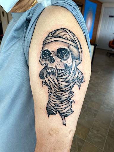 Explore father and son tattoos ideas, creative tattoo ideas in Columbus, available at Atlas Tattoo and Piercing Studio