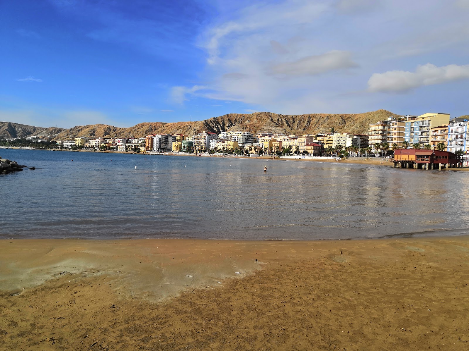 Photo of Crotone beach with brown sand surface