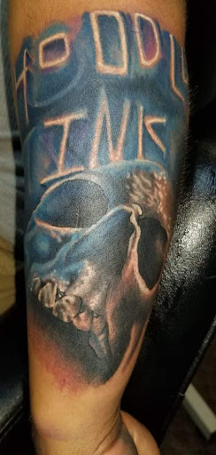 Explore 90s tattoo ideas, creative tattoo ideas in Angola, available at Hoodlum Ink