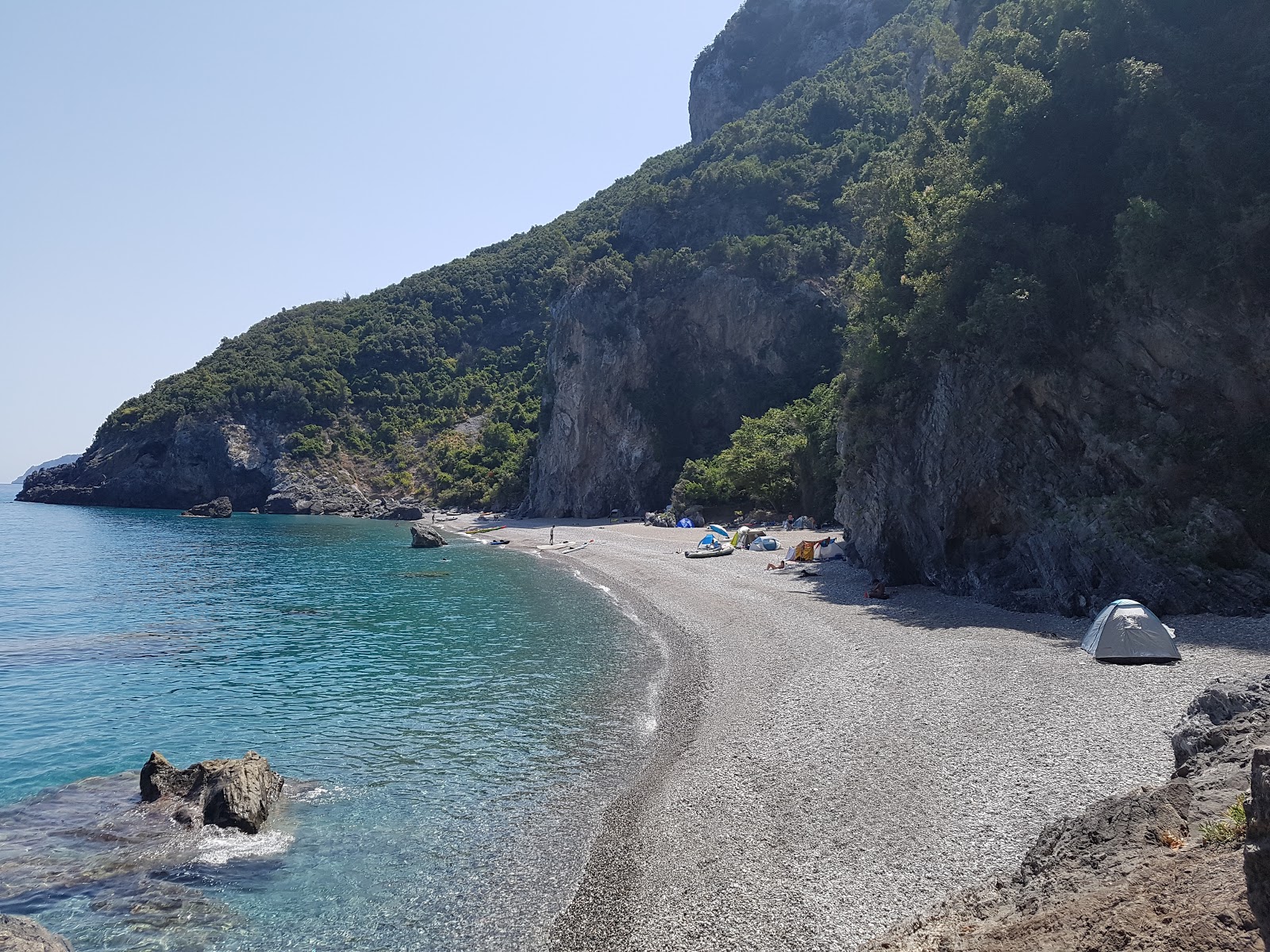 Photo of Damianos beach with gray fine pebble surface