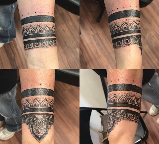 Explore tattoo ideas for female arm, creative tattoo ideas in Alamosa, available at The Shop Tattoo & Comics