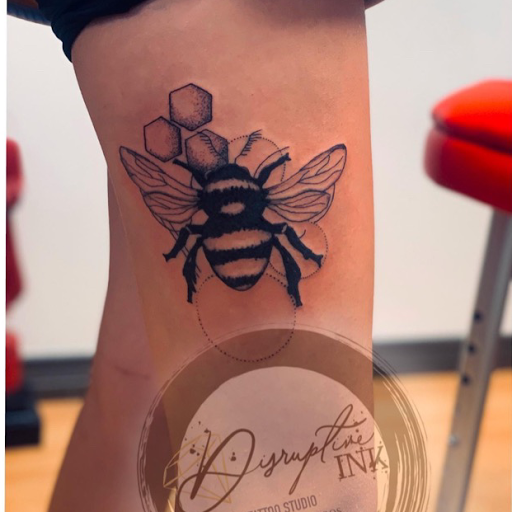 Explore rock n roll tattoo ideas, creative tattoo ideas in Denver, available at Disruptive Ink Tattoos