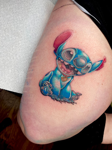 Explore leg tattoo ideas for females, creative tattoo ideas in Southampton, available at Le Uke Tattoo Studio