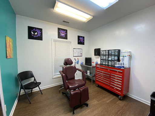 Explore spine tattoo cover up ideas, creative tattoo ideas in Mauldin, available at Whatever Piercing