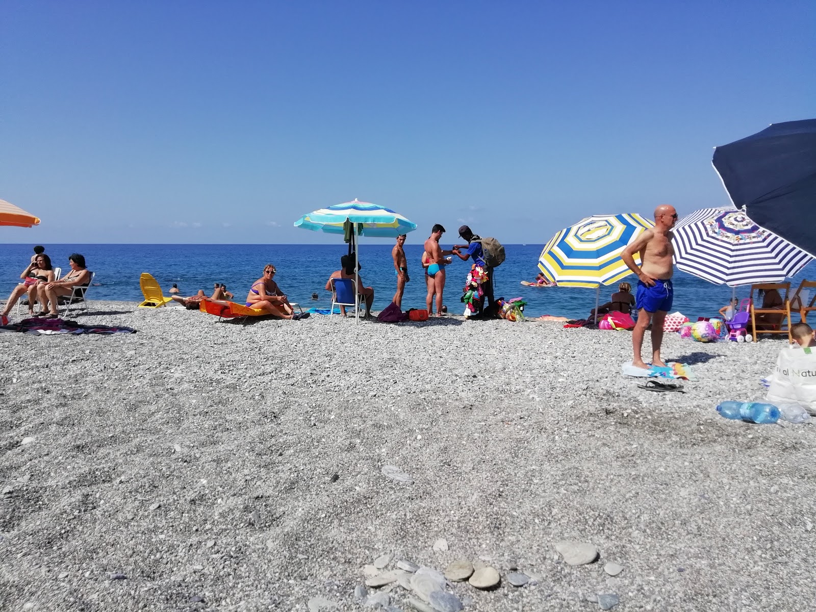 Fotografija Spiaggia Amantea z modra voda površino