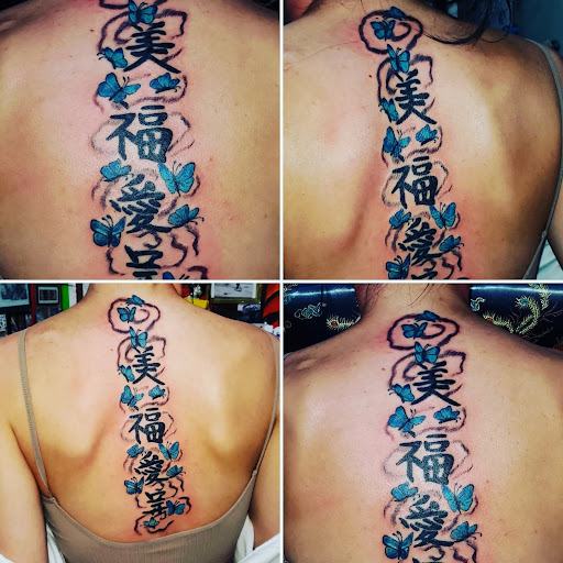 Explore mens quad tattoo ideas, creative tattoo ideas in Englewood, available at The Original Big Daddy Tattoo & Body Piercing est.1997 est.1997