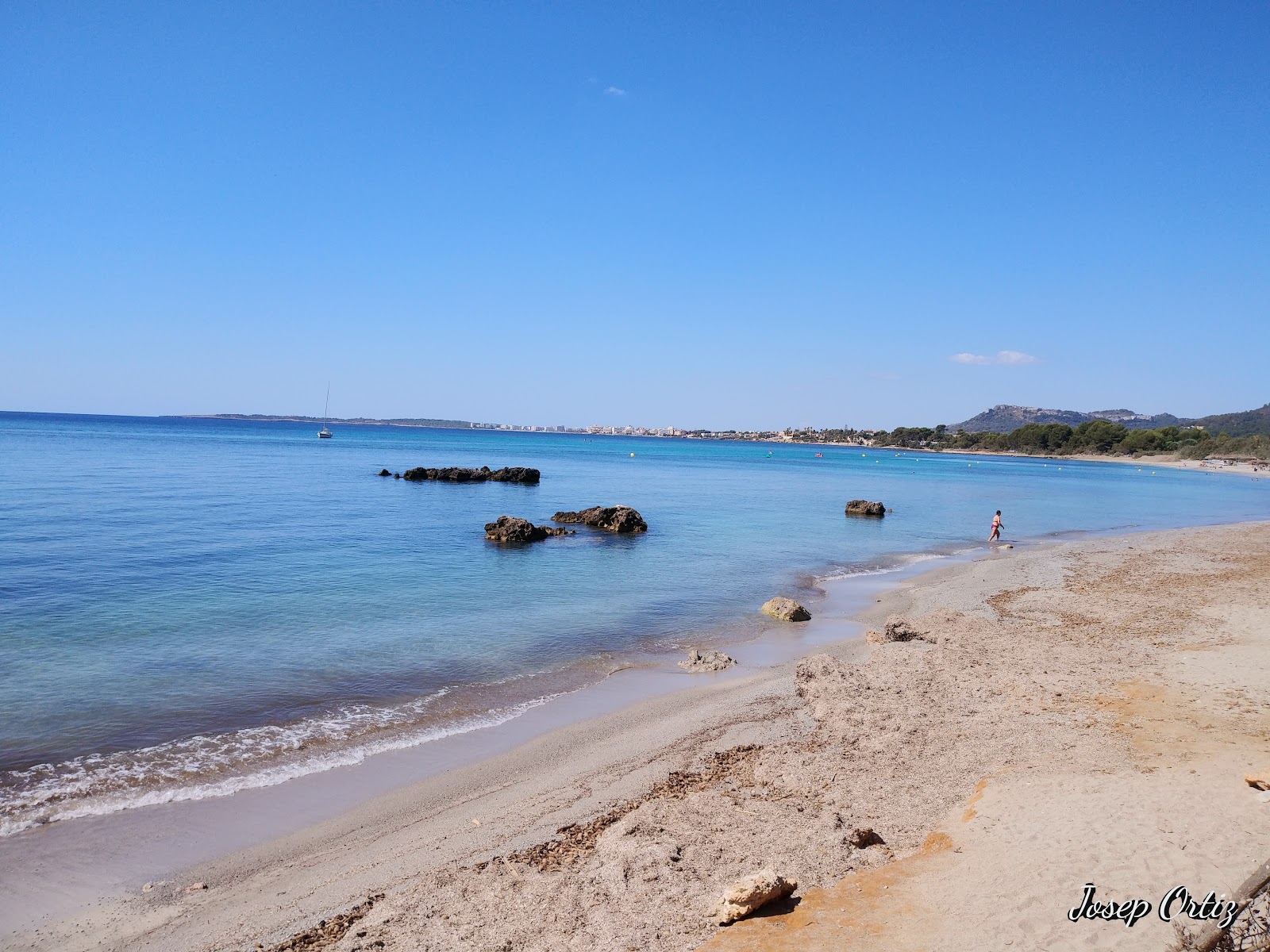 Fotografija Platja de Sa Marjal z prostoren zaliv