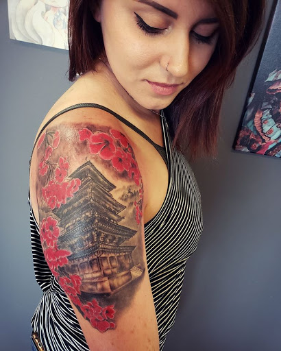 Explore unique breast cancer tattoo ideas, creative tattoo ideas in Flint, available at Black Eye Social Club Tattoo