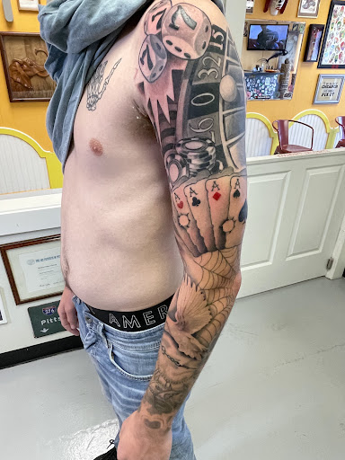 Explore ak47 tattoo ideas, creative tattoo ideas in Marietta, available at Monkeys Uncle Tattoo