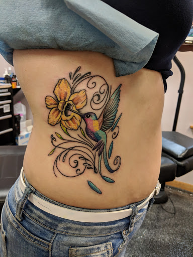 Explore rapper tattoos ideas, creative tattoo ideas in Kenosha, available at Kenosha Tattoo Company