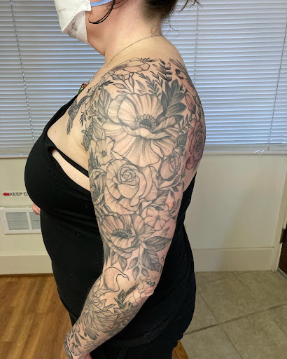 Explore guitar pick tattoo ideas, creative tattoo ideas in Bothell, available at Hometown Tattoo