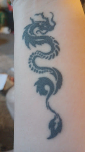 Explore nail tech tattoo ideas, creative tattoo ideas in Fond Du Lac, available at In Your Face Tattooz LLC