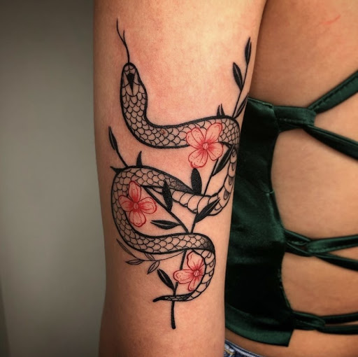 Explore female neck tattoo ideas, creative tattoo ideas in Davenport, available at Fine Ink Studios Tattoos
