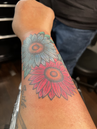 Explore stitching tattoo ideas, creative tattoo ideas in Cleveland, available at Kollective Tattoo Studio