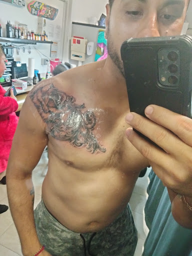 Explore tattoo cover up ideas for upper back, creative tattoo ideas in Passaic, available at District 36 Tattoo Parlor