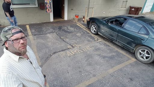 Explore tricep tattoo ideas for men, creative tattoo ideas in Jackson, available at T.R.A.P. Ink Tattoos and Piercings