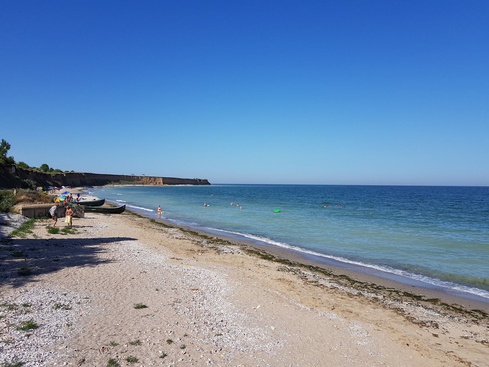 Foto van Plyazh Pescarus met helder schelpenzand oppervlakte