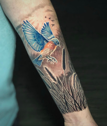 Explore harmonica tattoo ideas, creative tattoo ideas in Tampa, available at Emphasis Tattoo