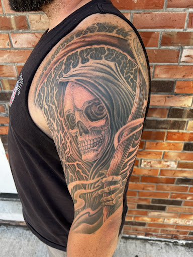 Explore dog tattoo ideas for men, creative tattoo ideas in East Peoria, available at Hybrid Art Studios-Tattoos