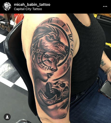 Find tattoos in between breast ideas for your next unique tattoo in Baton Rouge at Capital City Tattoo