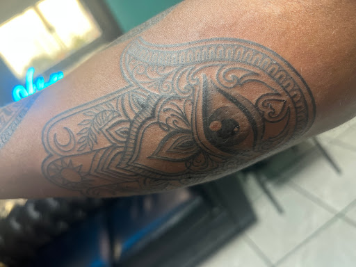 Explore surrender tattoo ideas, creative tattoo ideas in Las Cruces, available at Porter House Ink Piercing & Tattoo