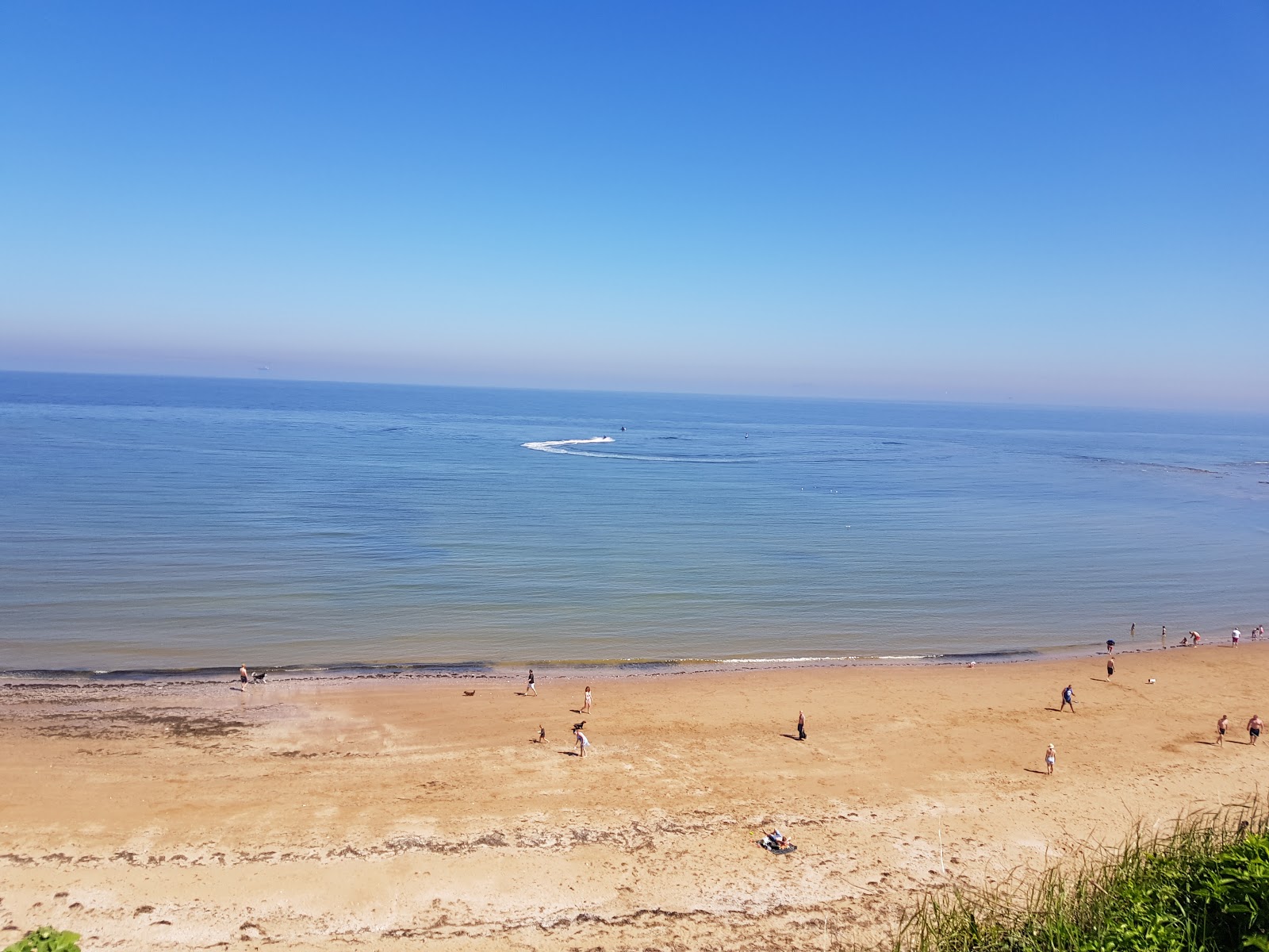 Photo of Kingsgate Bay beach and the settlement