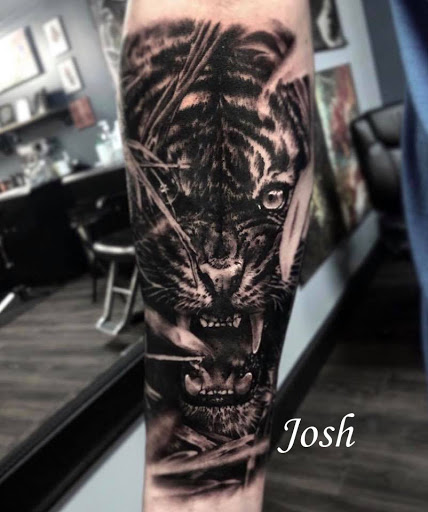 Explore hellscape sleeve tattoo ideas, creative tattoo ideas in Sanford, available at Venom Ink Tattoo