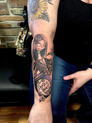 Explore dinosaur tattoo ideas for son, creative tattoo ideas in Logan, available at 44th Street Tattoo & Piercing