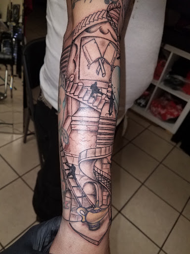 Explore 1 2 sleeve tattoo ideas, creative tattoo ideas in Bowling Green, available at The Mad Tatter, L.L.C.