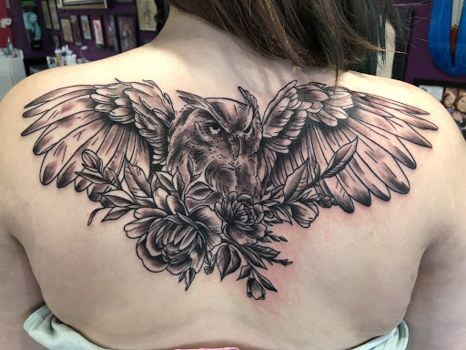 Explore tattoo ideas for lower abdomen, creative tattoo ideas in Lewiston, available at Artistic Soul Tattoos
